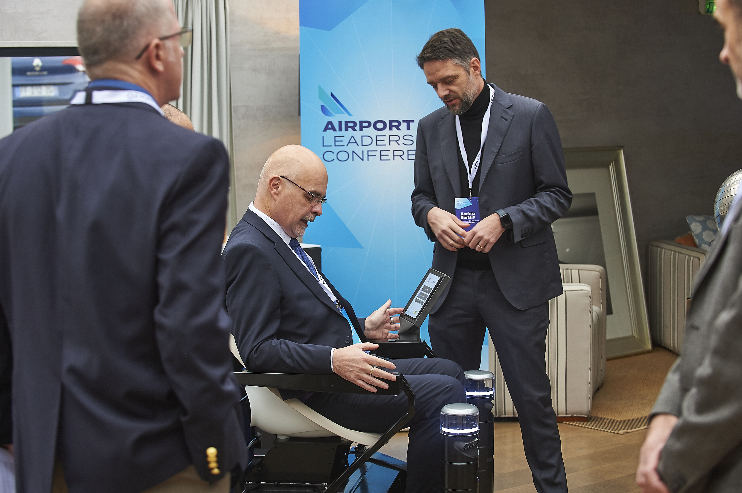 Delegate trying a mobility technology demo at the 2023 Airport PRM Leadership Conference