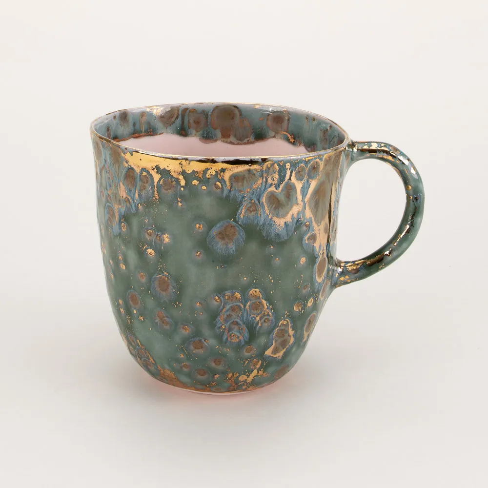 Wheel-thrown coffee mug made in Italy by Coralla Mauiri inspired by the masterpieces of Michelangelo with a playful interpretation