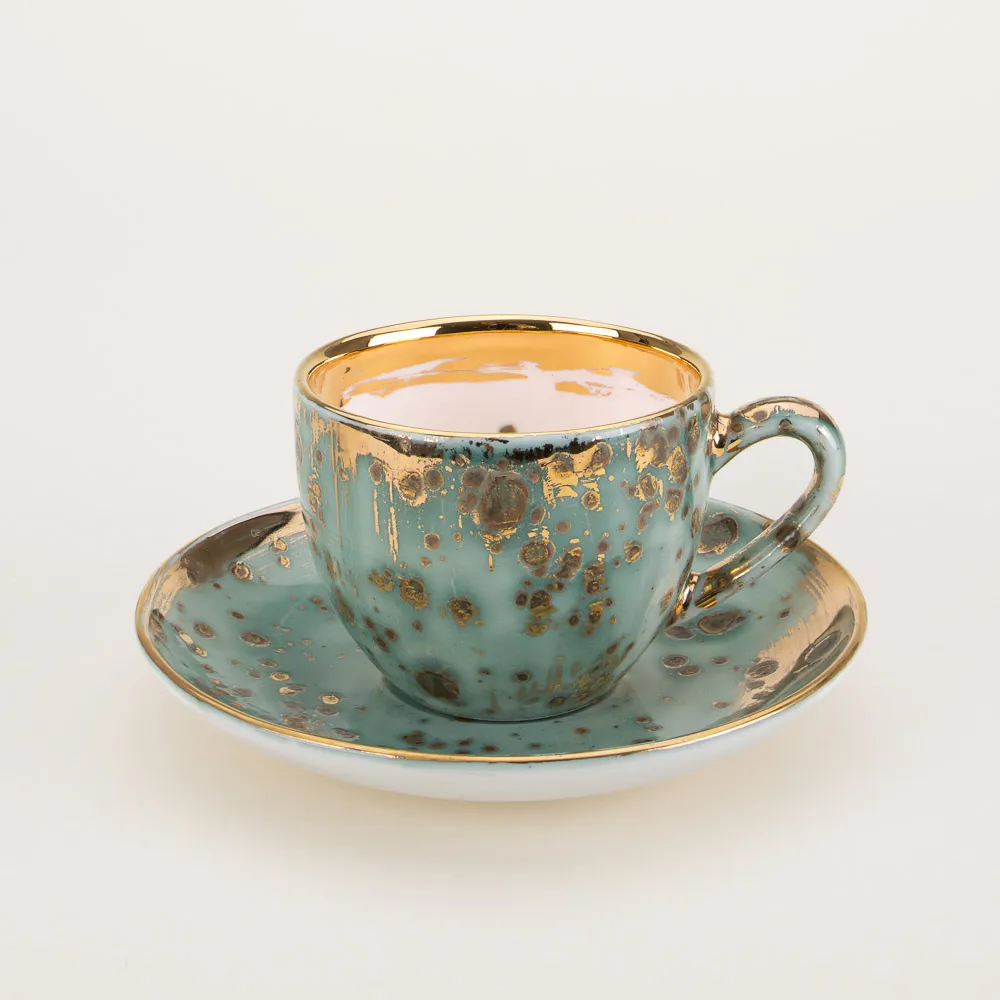 Michelangelo series espresso cup and saucer made in Italy by Coralla Maiuri inspired by the master's sculptures and frescoes with a playful interpretation