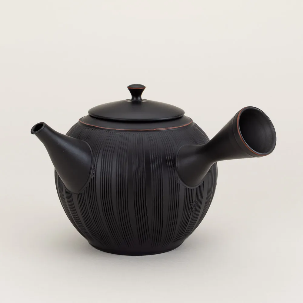 Handmade blackened kushime teapot by master artisan Reiko Koie in the ancient pottery city of Tokoname