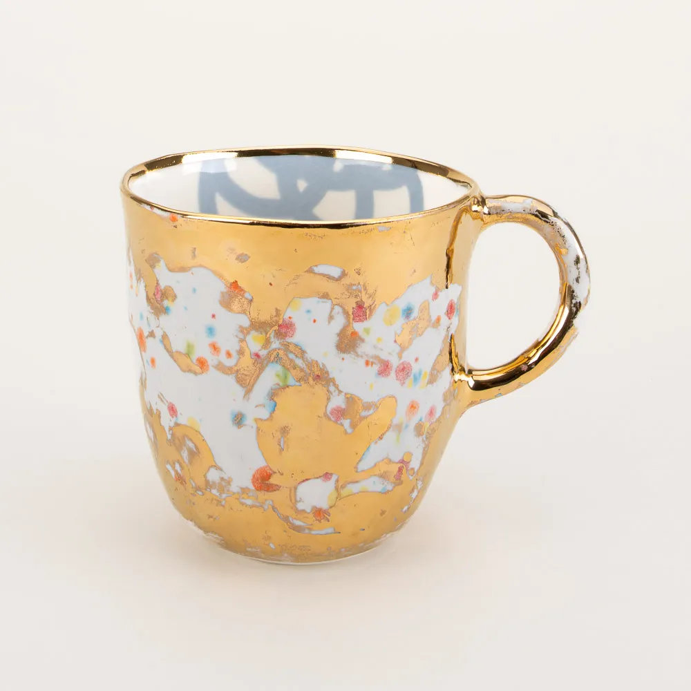 Wheel-thrown coffee mug made in Italy by Coralla Mauiri inspired by Roman antiquity with a playful interpretation