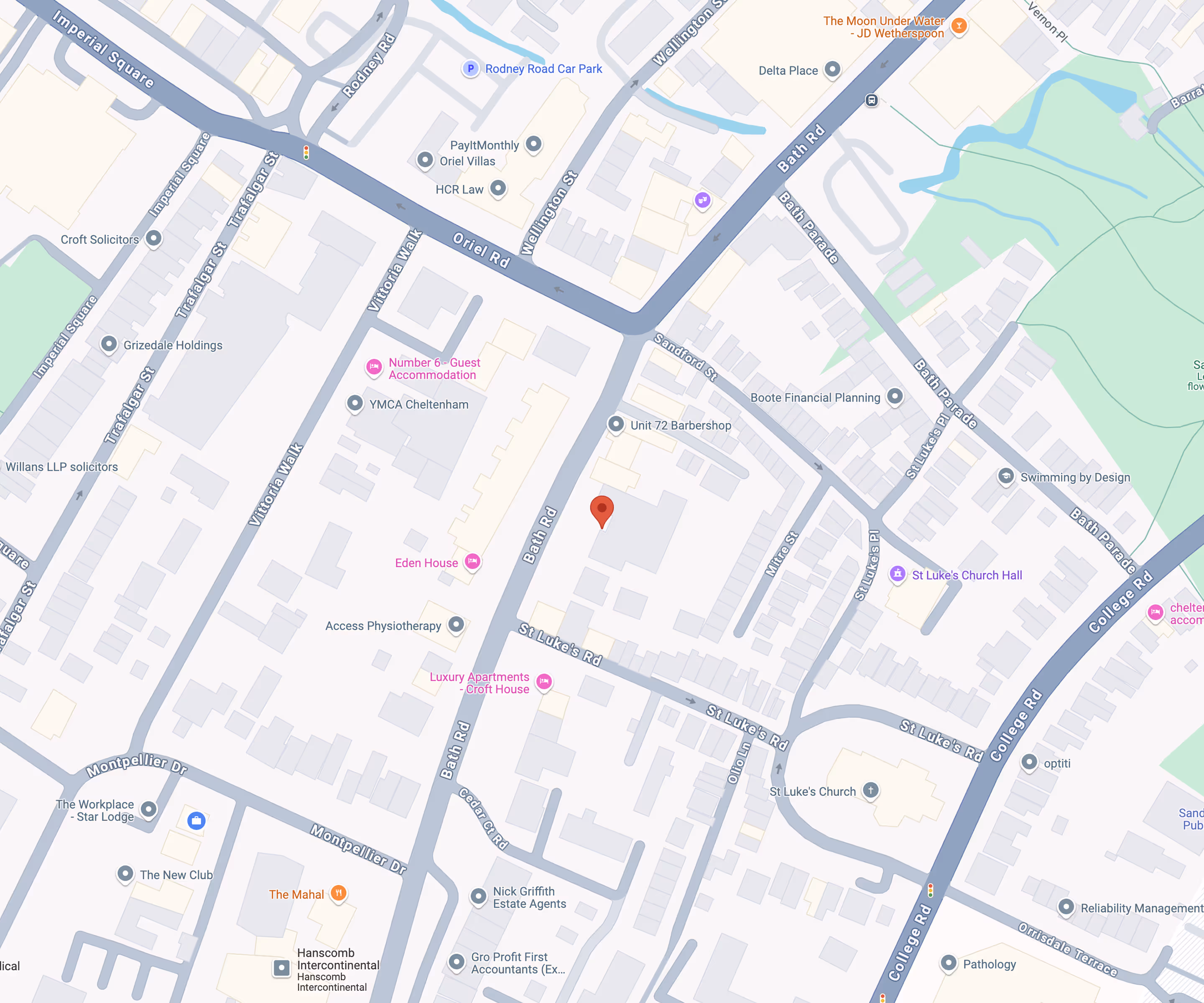 Map showing Bath Road and surrounding streets in Cheltenham with marked locations including St Luke's Church, YMCA Cheltenham, and various businesses.