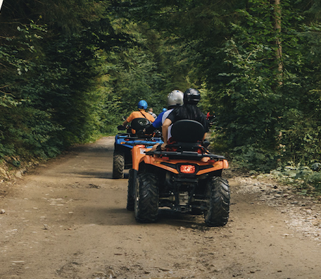 People riding on a trail