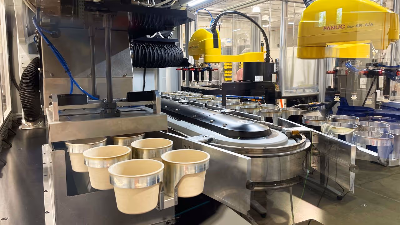 Custom automated laser cutting system for paper cardboard cups for mass production.