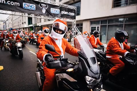 Santas on motorbikes at the start of Santa's on a Bike