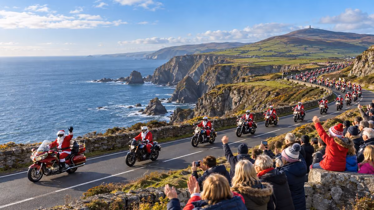 Santas riding along the Isle of Man coast road as crowds wave