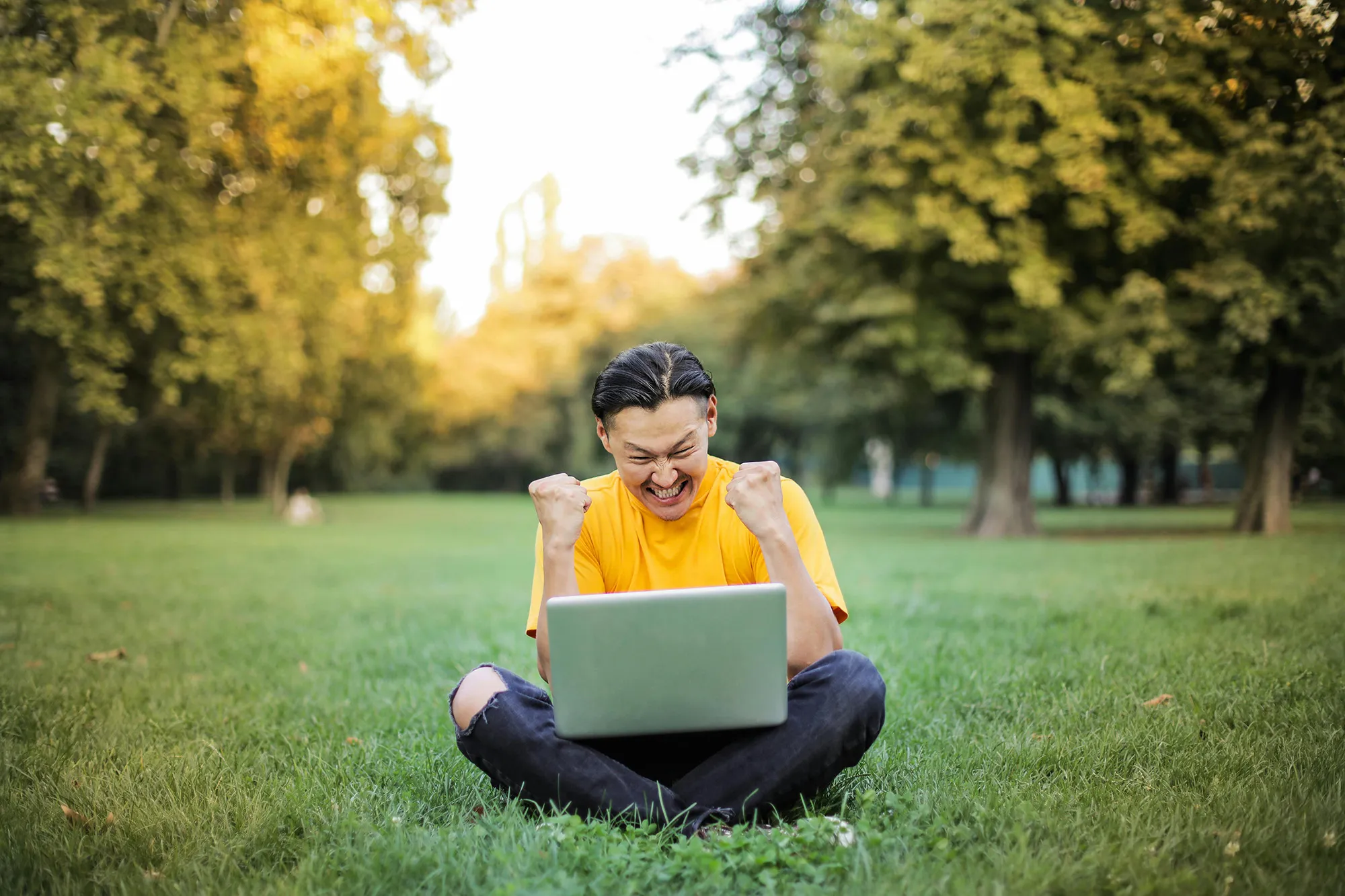 Happy boy with a laptop
