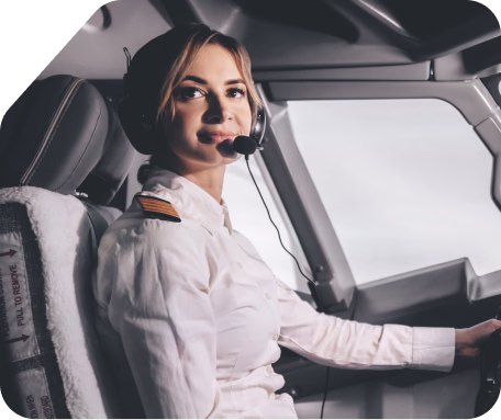 Pilot wearing a headset in the cockpit