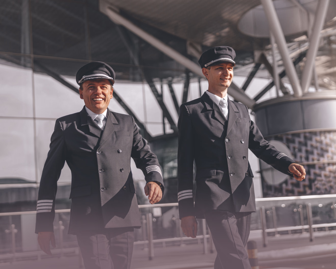 Two pilots walking through an airport terminal