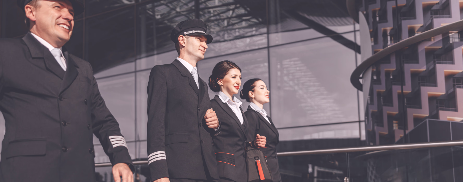 Pilots and cabin crew walking through the terminal