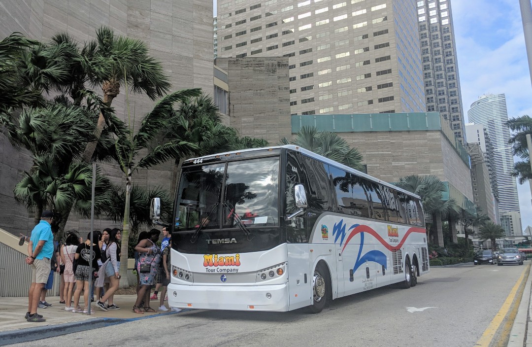 Passengers boarding bus in downtown Miami
