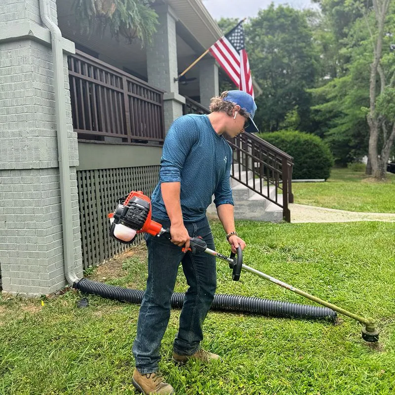 Landscaping crew installing new mulch and edging Blacksburg VA