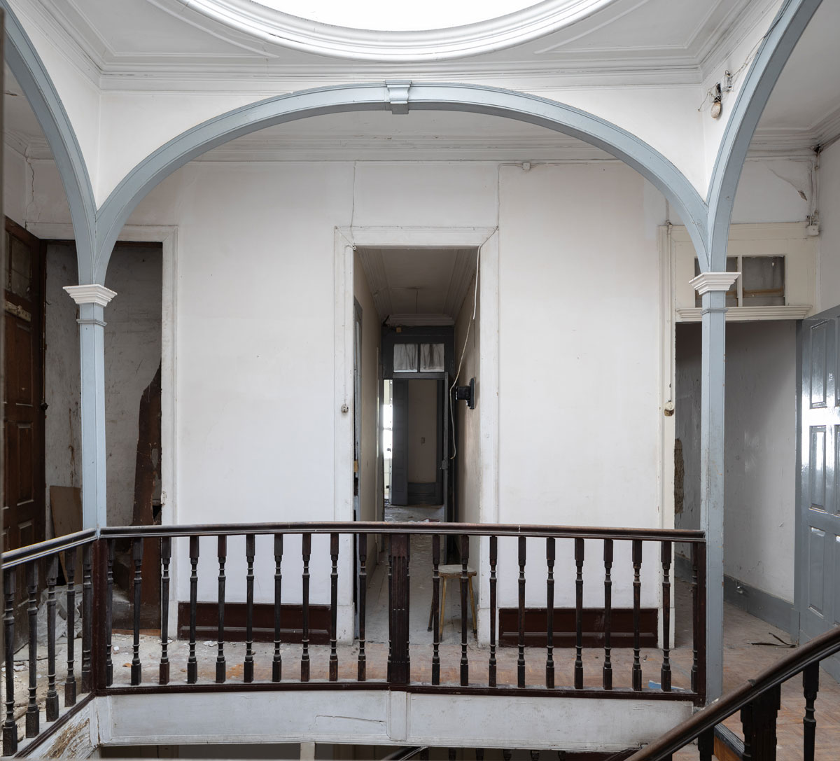 Historic staircase inside the Rua de Cedofeita house before its restoration and transformation into Casa Cedo.