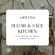 Sign reading 'INSIDE SUGAR & SAGE KITCHEN A GLIMPSE OF WHAT AWAITS YOU!' with white roses in the background.