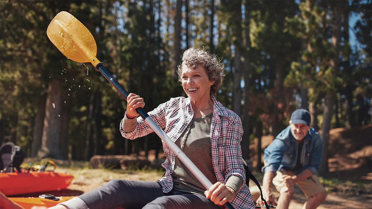 mature couple kayaking