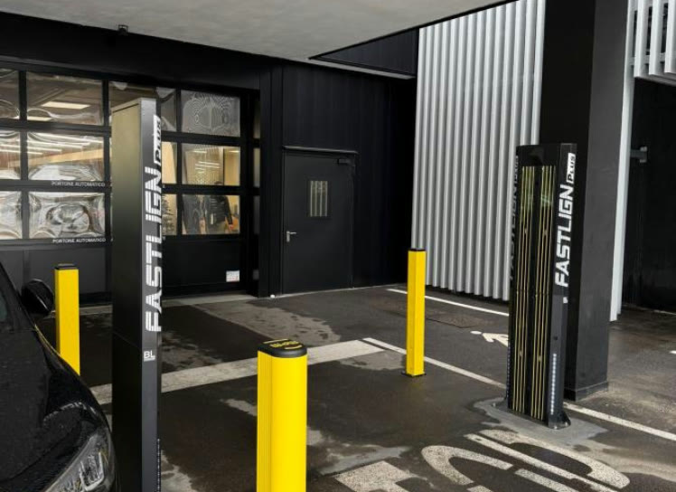 FASTLIGN towers installed at a workshop entrance