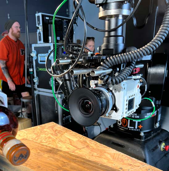 High-speed Phantom camera mounted on Bolt robotic arm for precision tabletop food and beverage cinematography — a Philly-based motion control production setup by Big River Film Co.