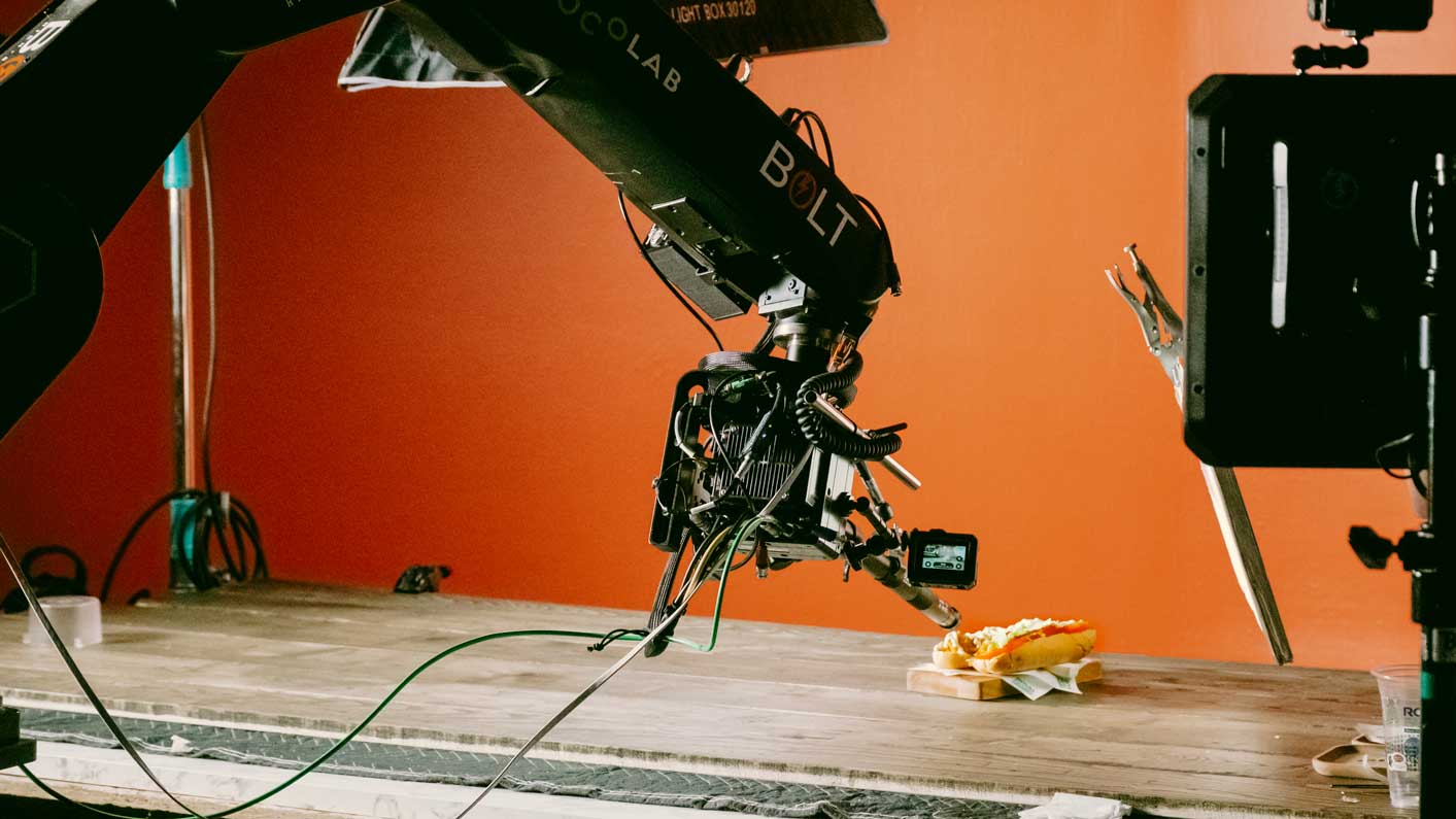 Bolt high-speed robotic camera arm capturing cinematic tabletop footage of a sub sandwich on set, showcasing Big River Film Co.’s precision motion control and slow-motion video production for food and beverage brands.