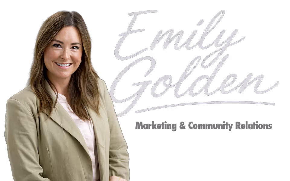 Smiling woman with long brown hair wearing a light green blazer and white blouse, with handwritten-style text reading 'Emily Golden' and a star icon.