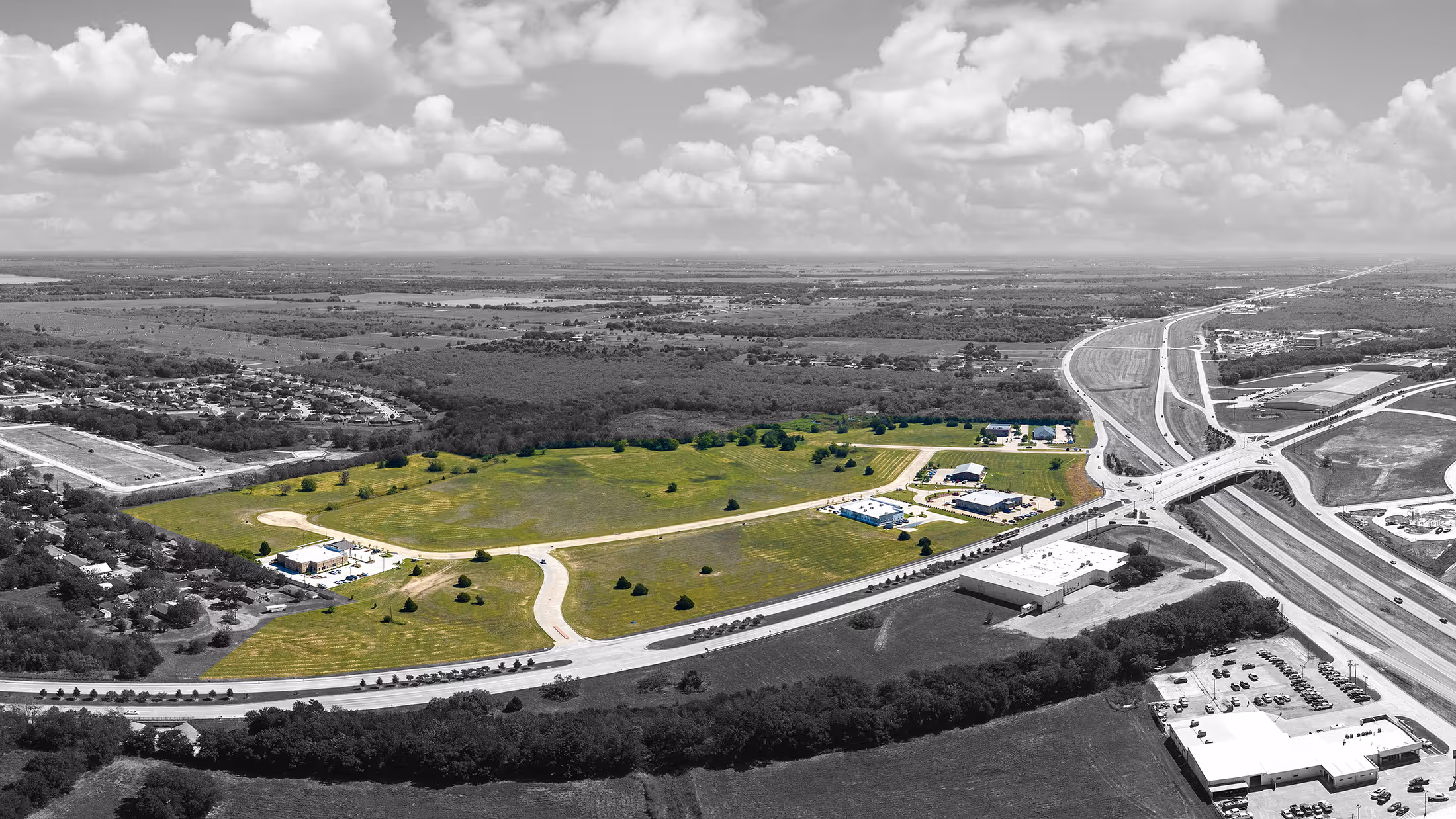 Explore Prairie Creek Crossing Business Park, a premier commercial property available in Kaufman, Texas. Aerial drone footage showcases the site's prime location, acreage, and development potential in the heart of Kaufman County.