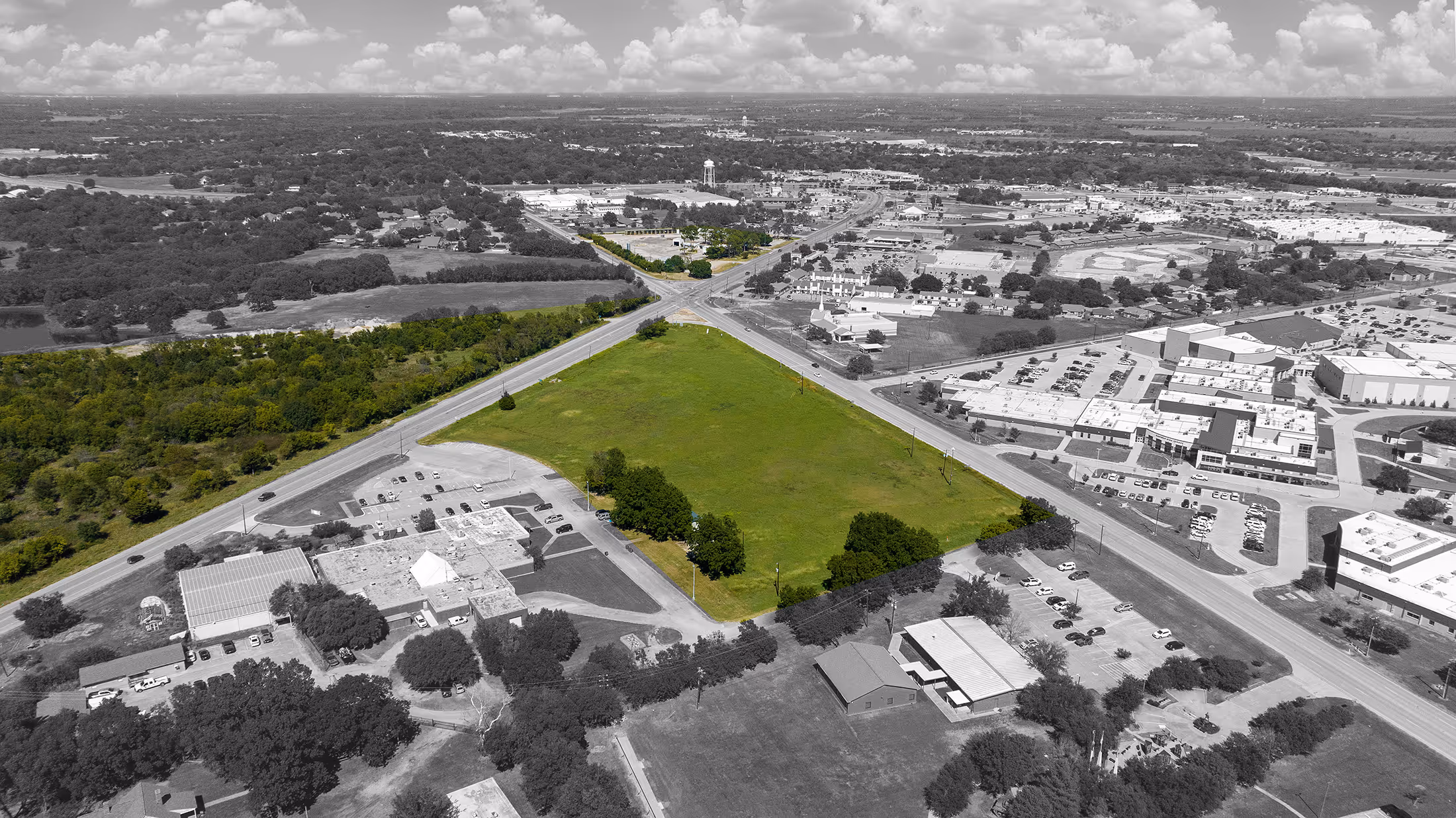Aerial drone view of an available commercial property in Kaufman, TX — development-ready acreage with road frontage in fast-growing Kaufman County.