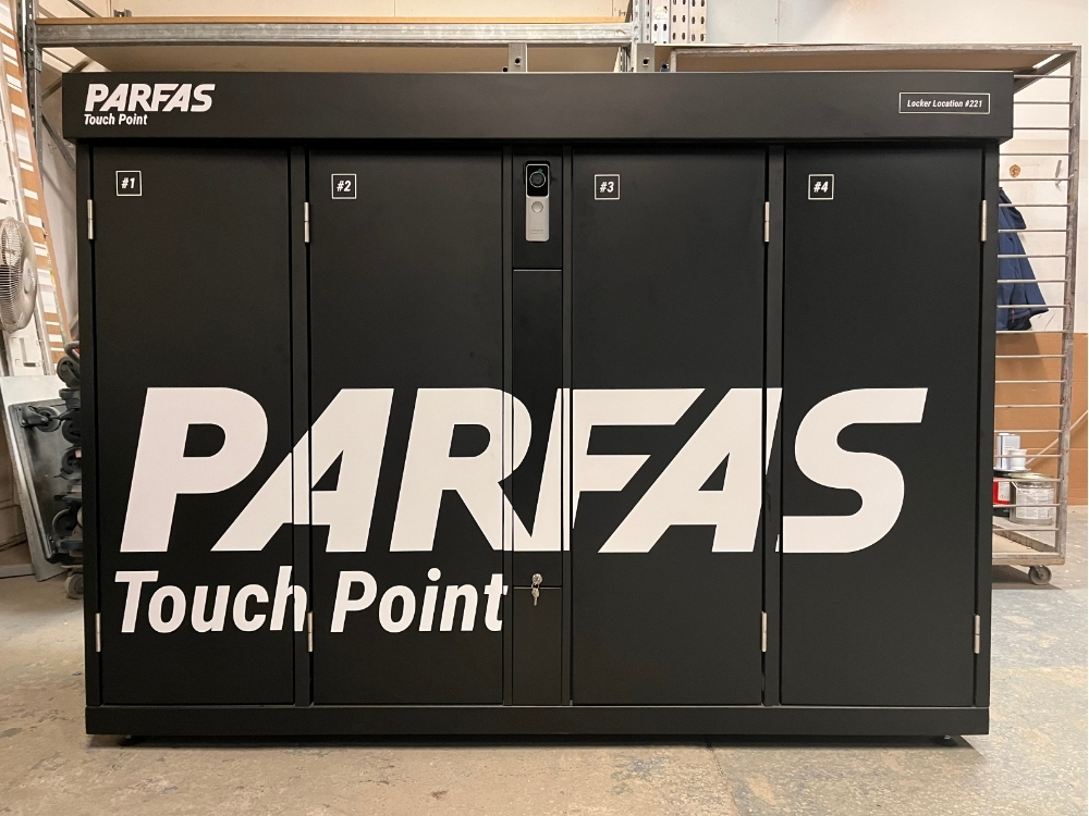 Installed Parfas Touch Point collection locker with finished branding.