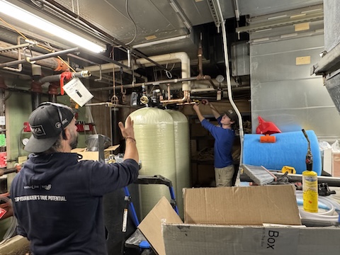 Tabor Water Solutions employees working in a commercial facility