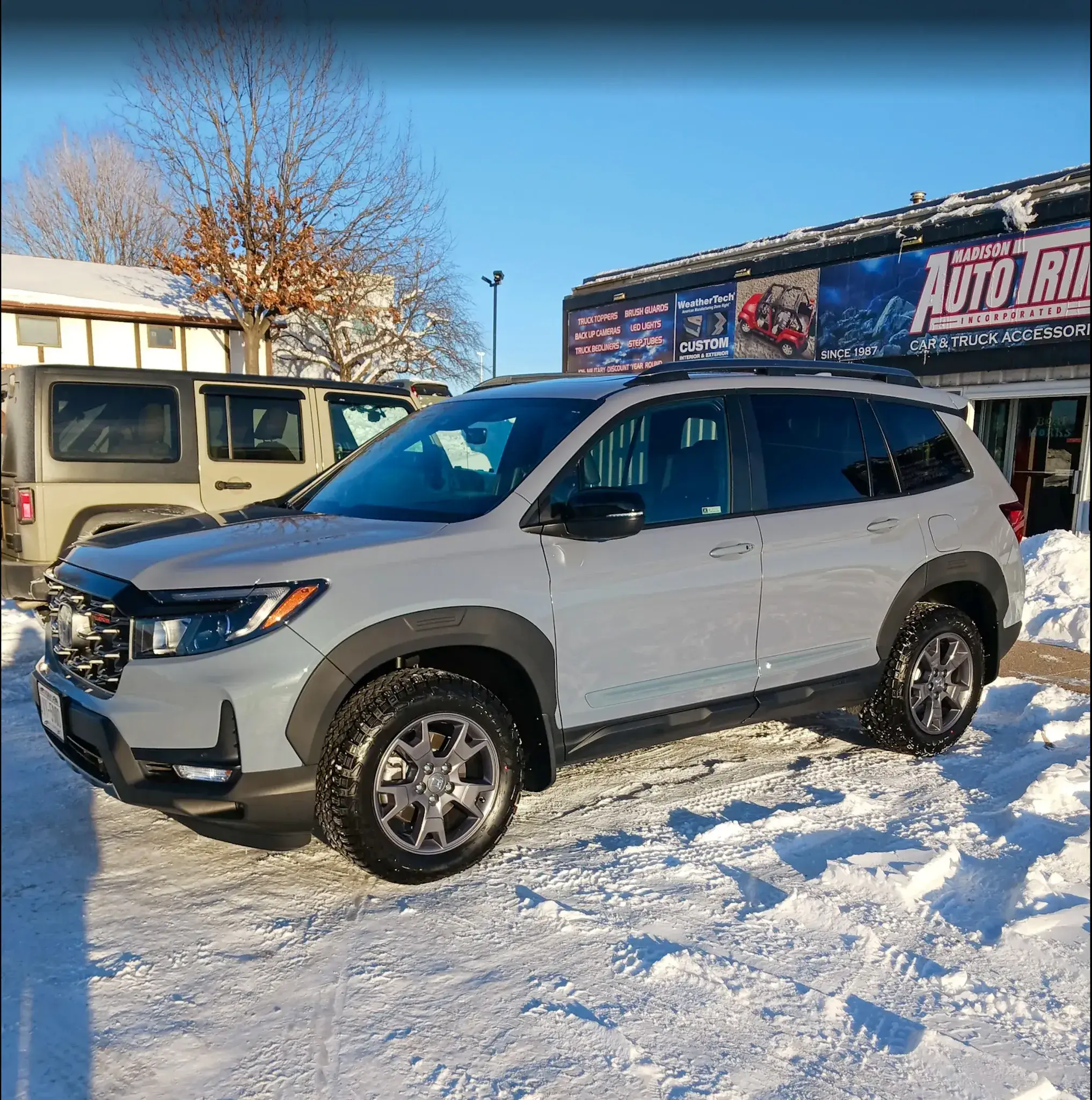 2024 Honda Passport freshly detailed and coated with a ceramic paint sealant and rustproof service from Madison Auto Trim