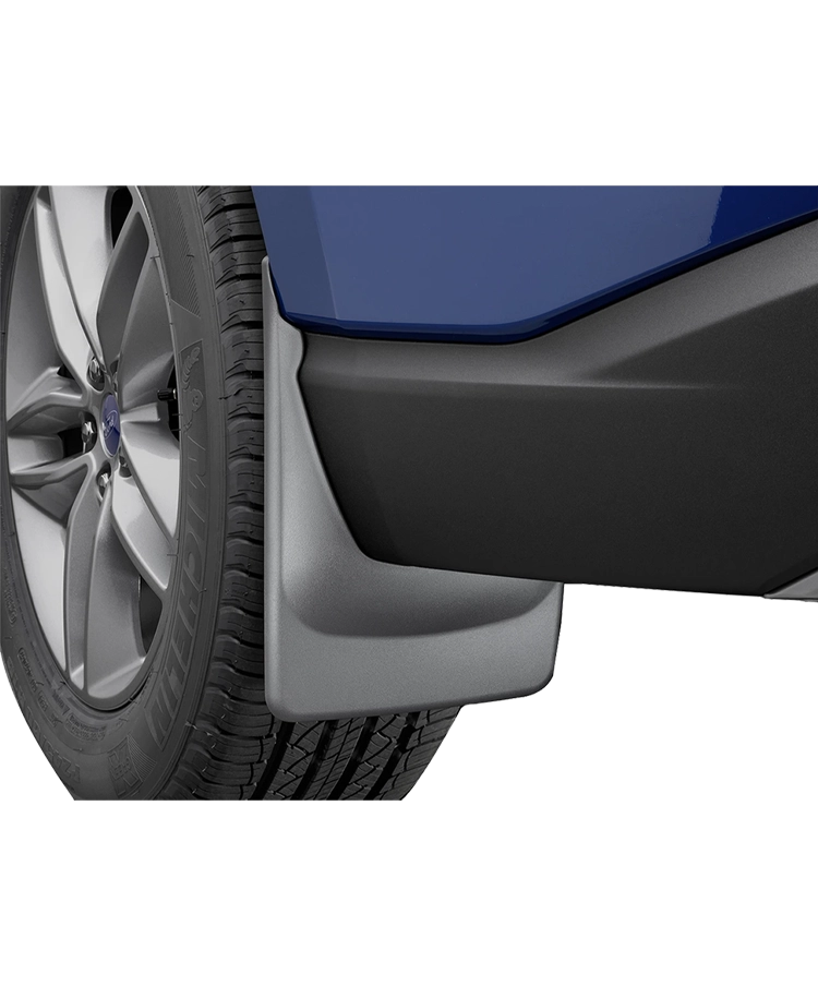 A blue SUV with WeatherTech mud flaps installed on the back wheels.