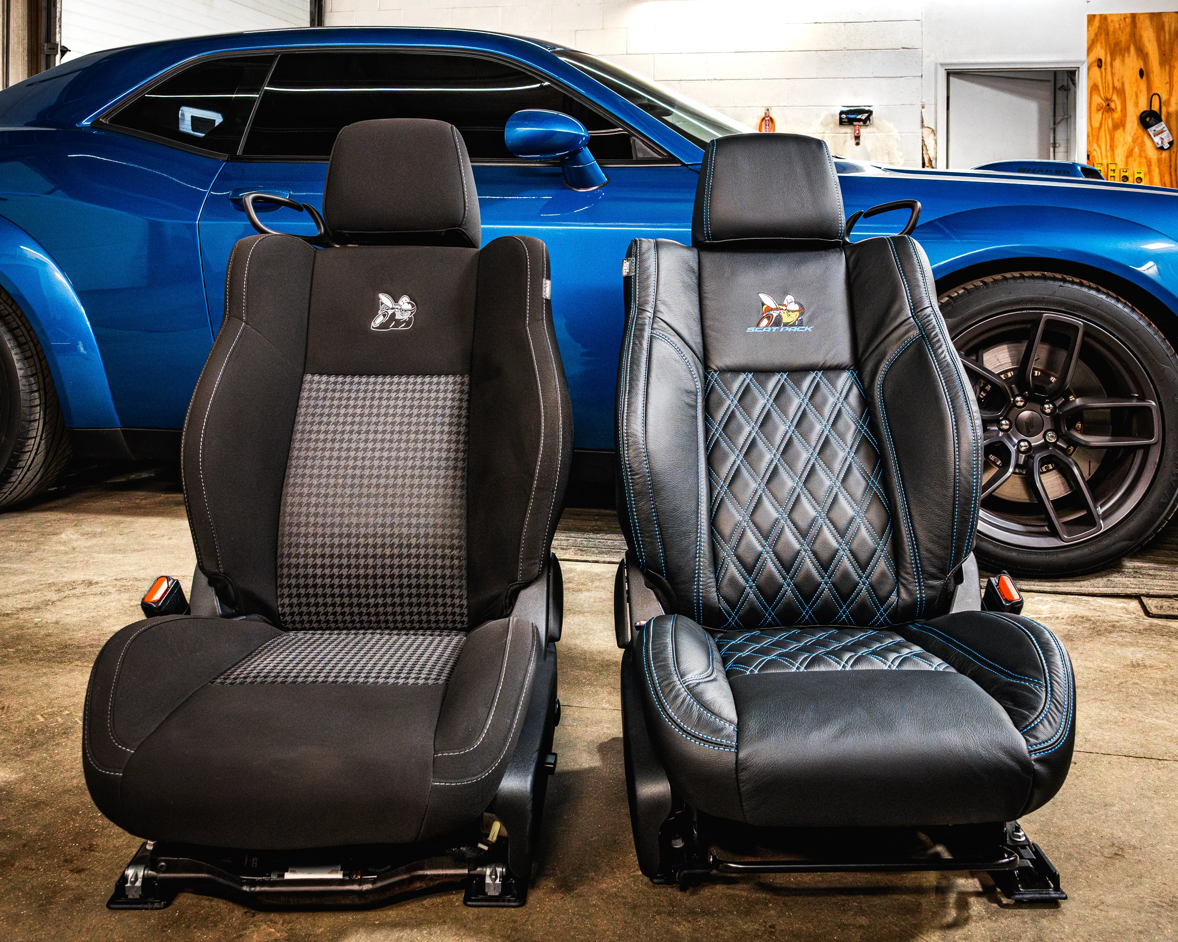 Three seats in a single row of grey and white custom Katzkin leather rear seats professionally installed by Madison Auto Trim, Wisconsin.