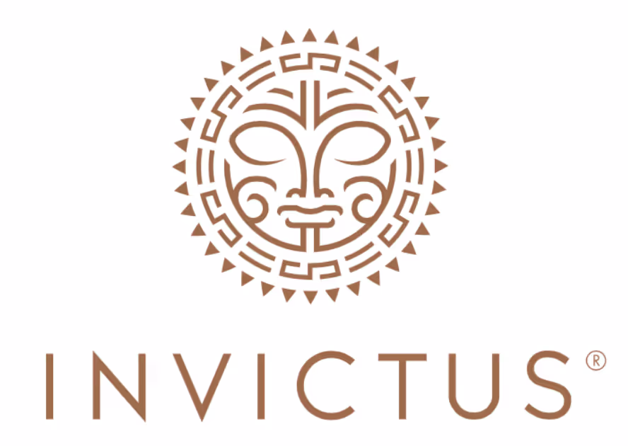 Invictus logo featuring a stylized tribal sun face above the brand name in brown text.