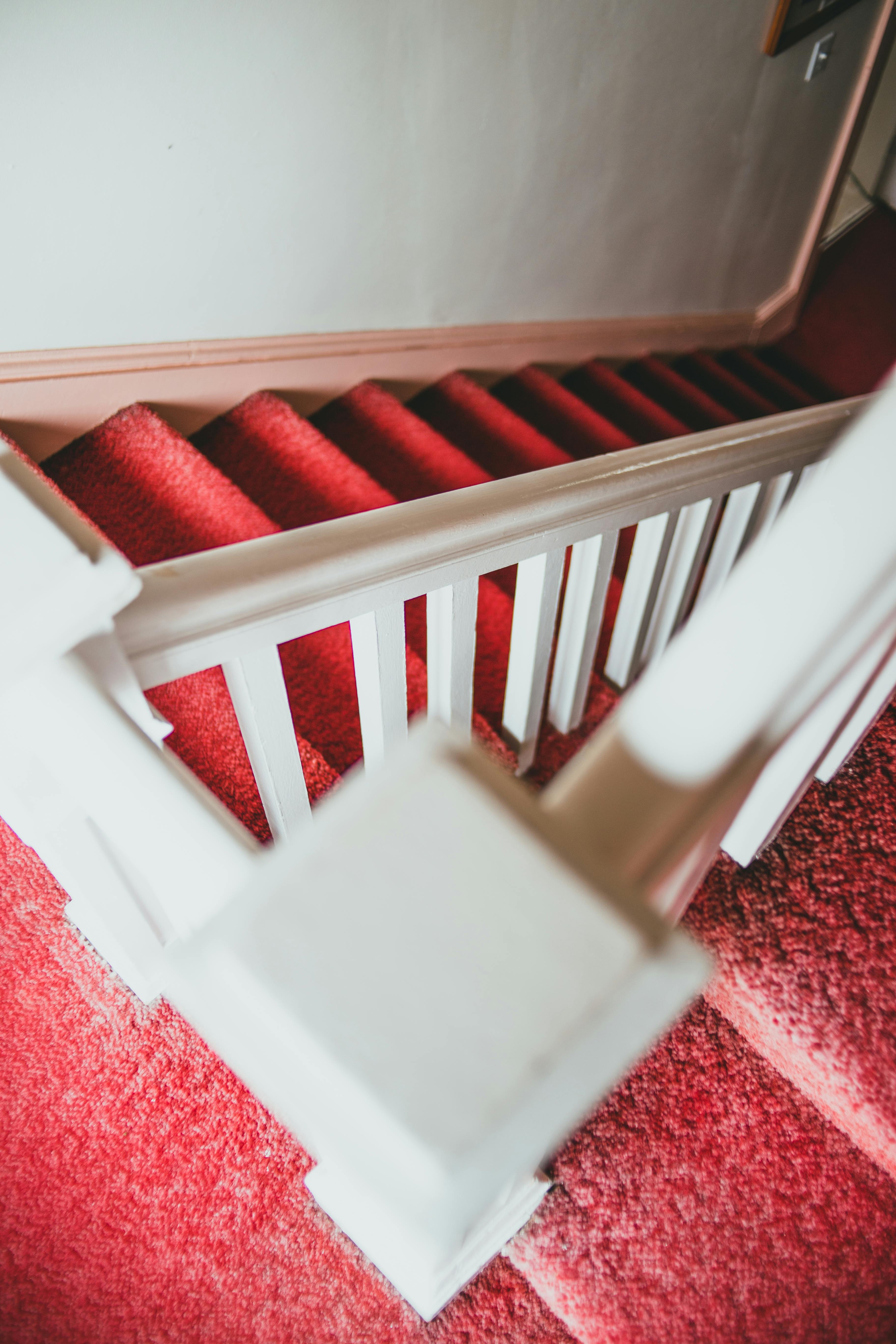 Professional stair carpet fitting in Peterborough — twist pile carpet on home staircase installed by Cambridgeshire Carpets