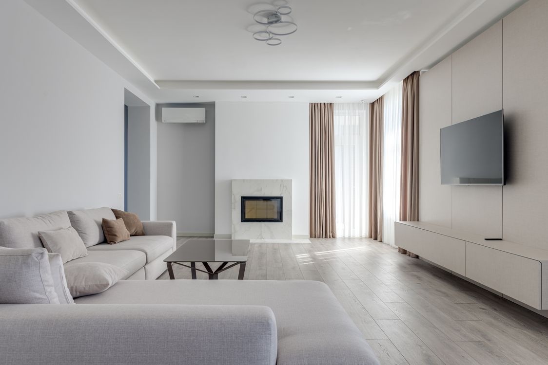 Tonal living room interior with coordinated colours and carpet flooring in a Peterborough home