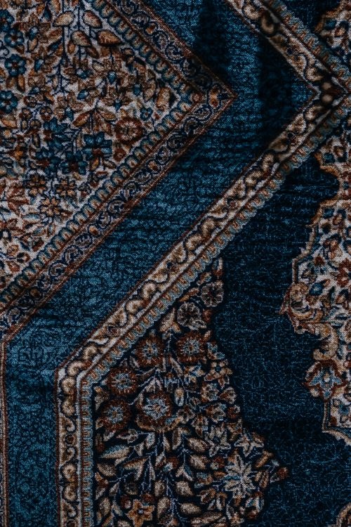 Patterned geometric carpet in a Peterborough home — textured loop and geometric repeat carpet guide 2026