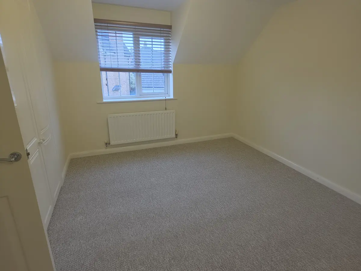 Hard-wearing grey twist carpet for a landlord's loft bedroom.
