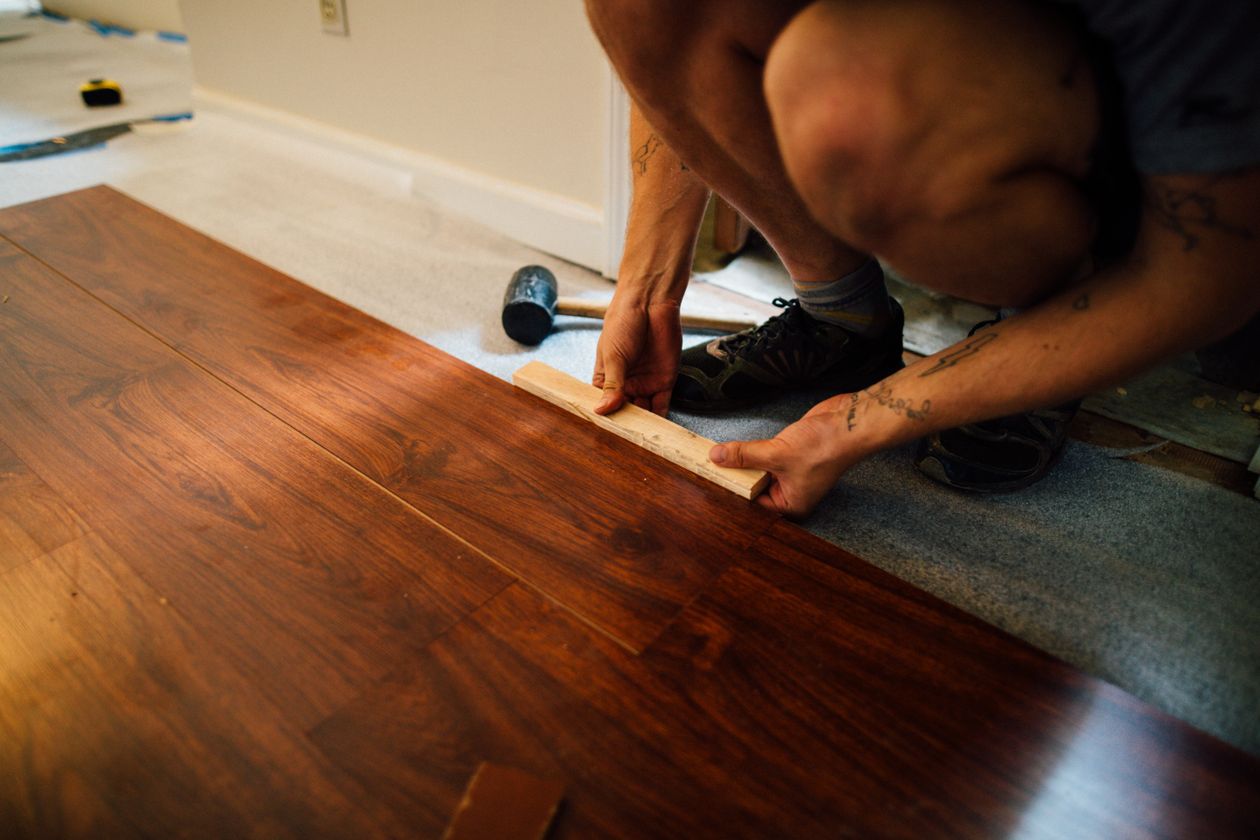 Subfloor levelling before fitting in Peterborough, PE1 — Cambridgeshire Carpets