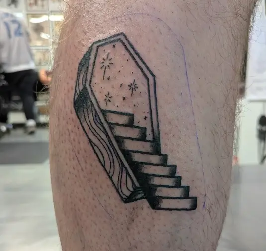 tattoo of a coffin portal