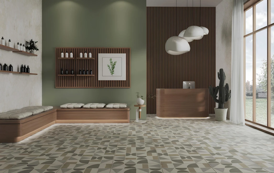 A living room with beautiful green floor tiles.