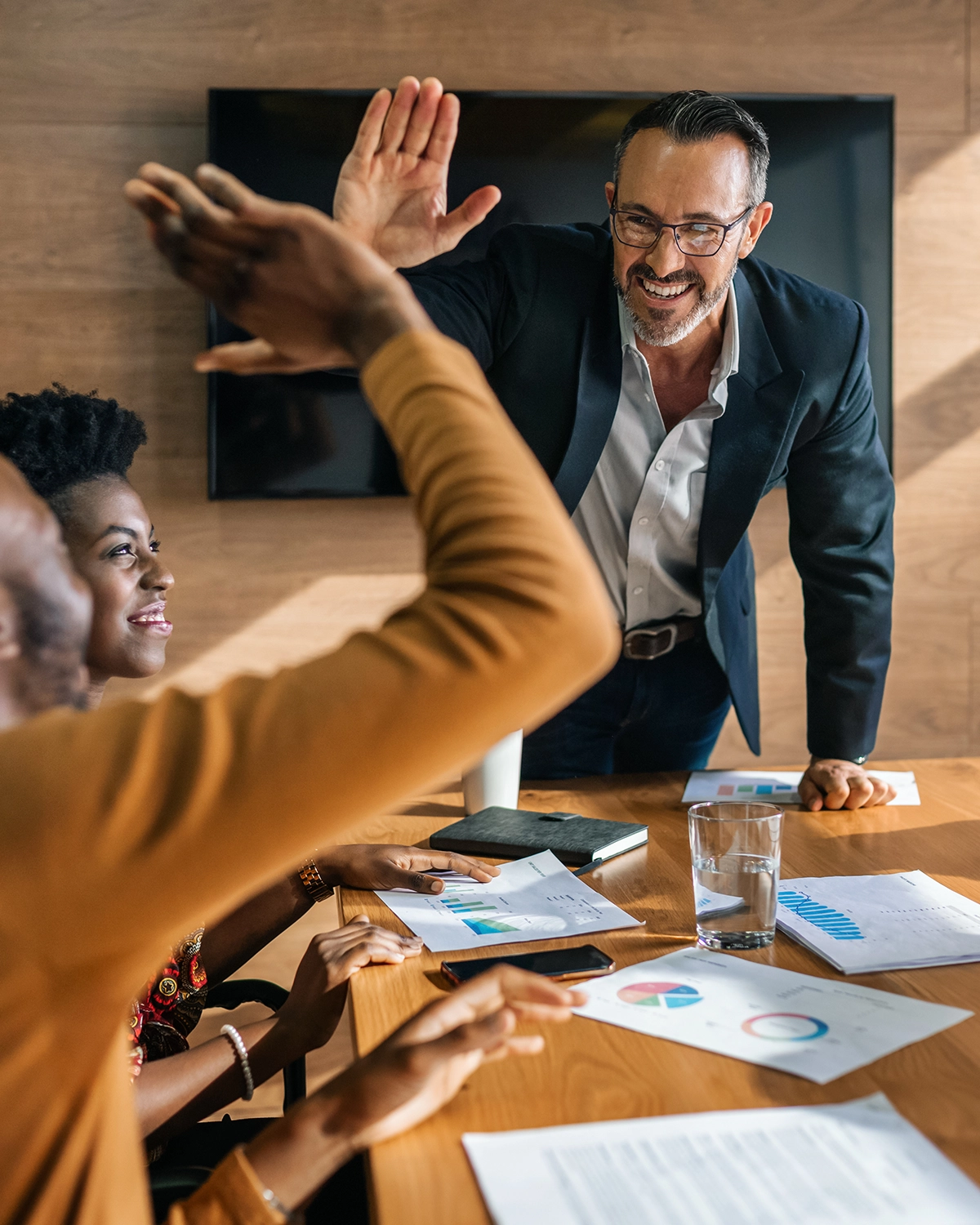 teamates high fiving each other
