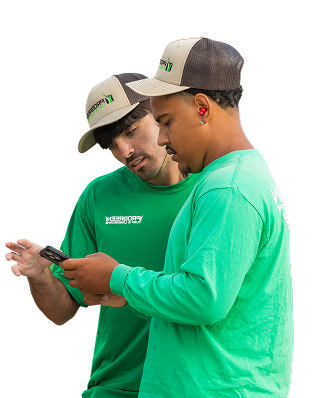 Crew members checking phone