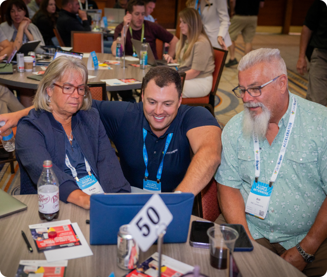 Attendees working through LeanScaper together at a table
