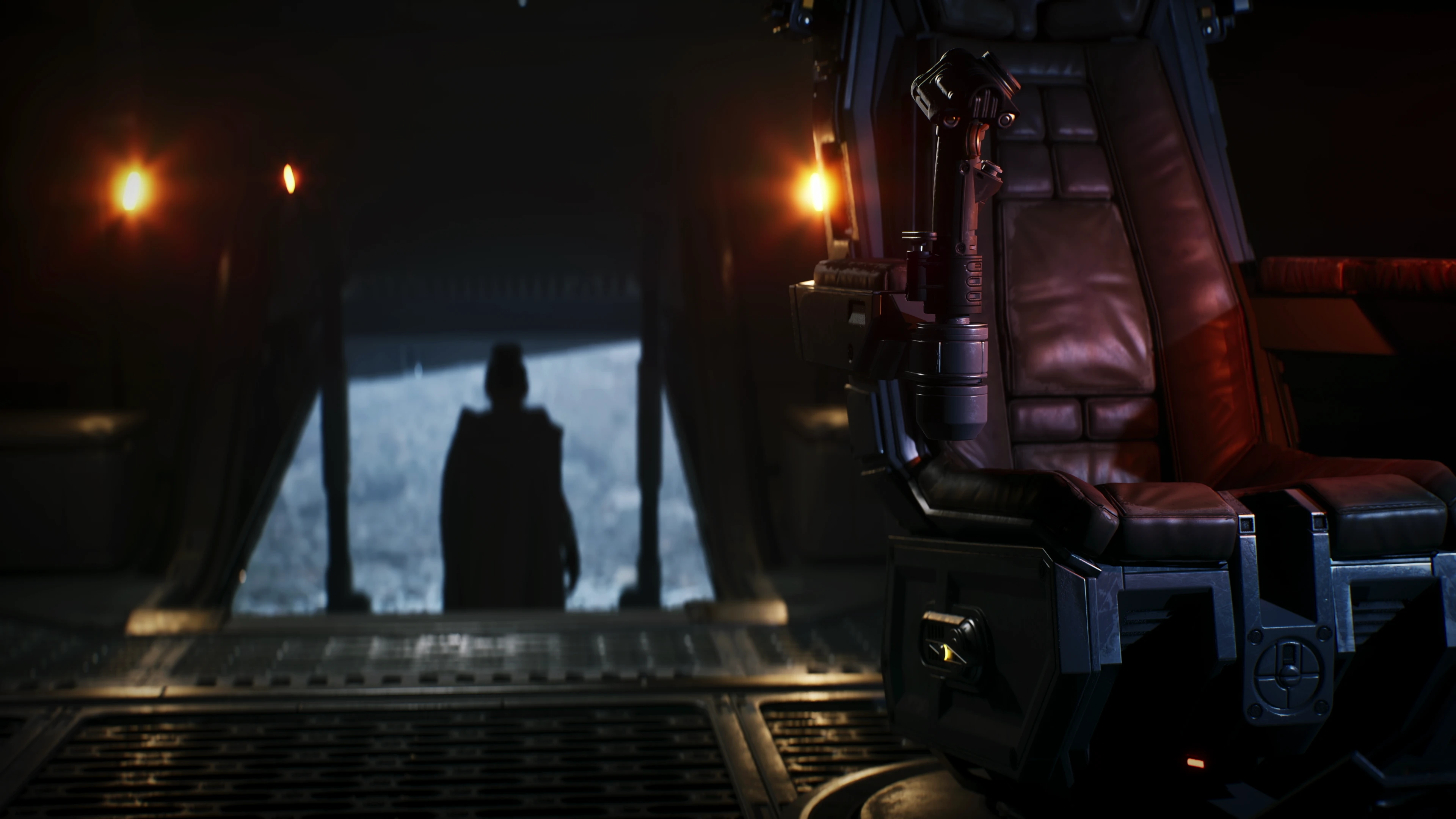 Inside a dark aircraft or spacecraft with a sleek black seat in the foreground and a blurry silhouette of a person standing near an open ramp in the background.