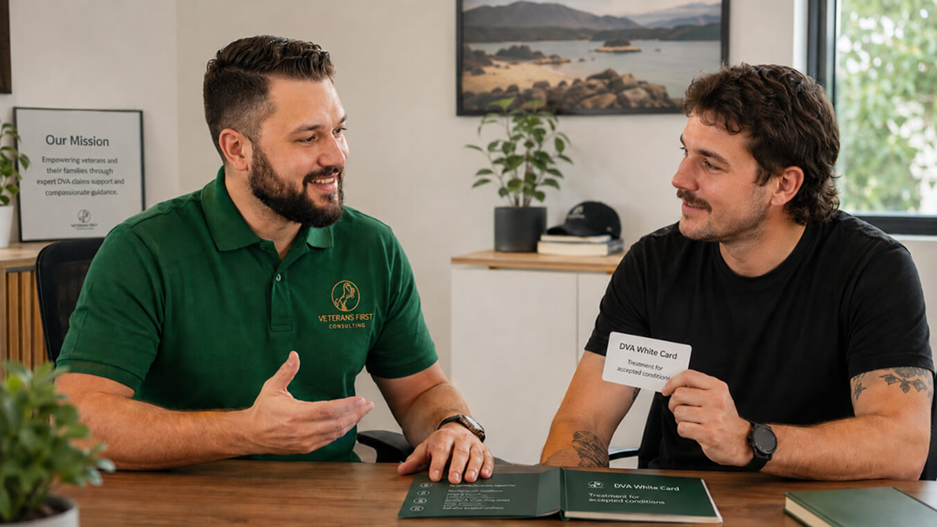 Veterans First Consulting adviser discussing DVA White Card benefits with a young veteran holding a White Card in a professional office.