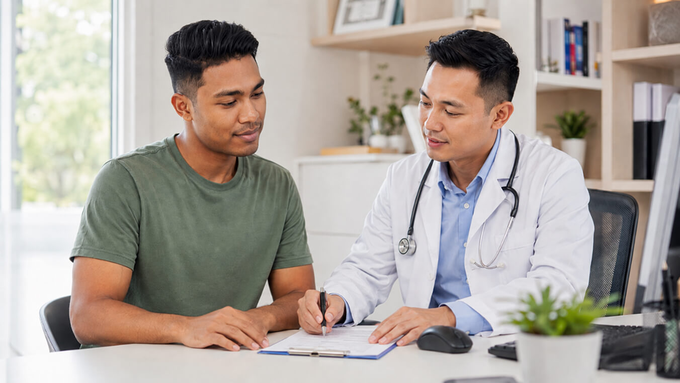 Young veteran arranging a GP referral to access DVA nursing care at a modern Australian clinic.