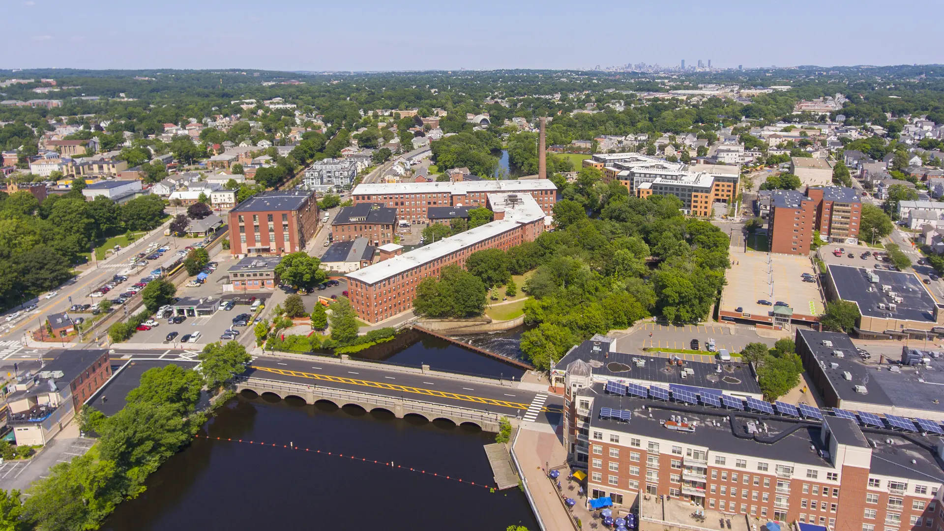 covered patio with tables and chairs