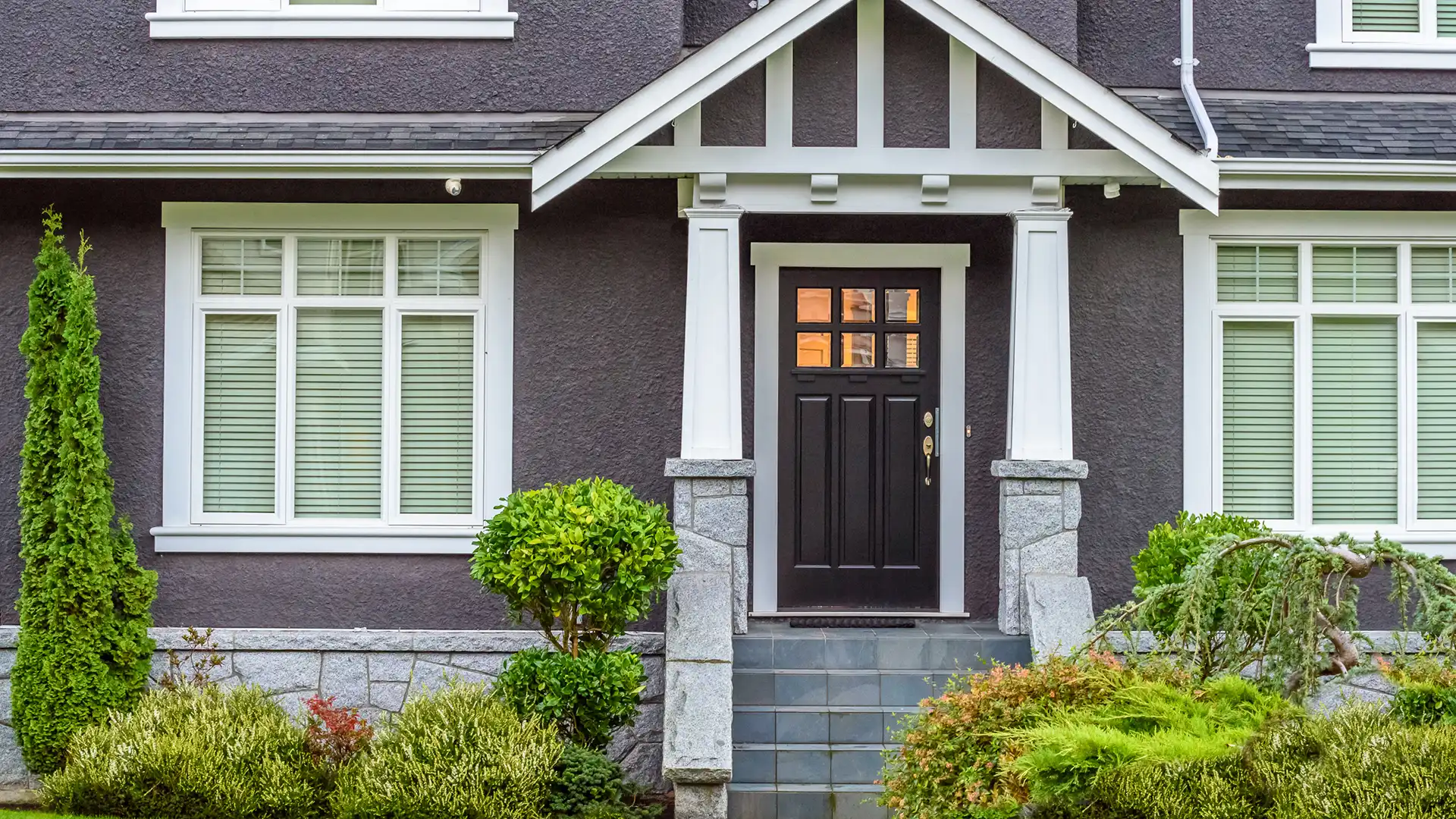 covered patio with tables and chairs