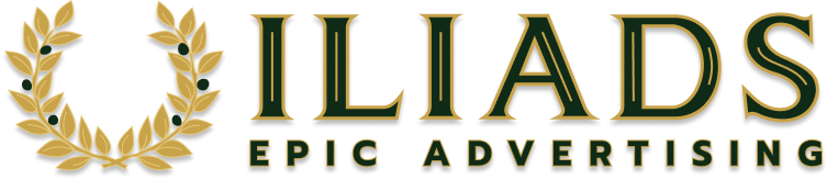 Logo for ‘ILIADS Epic Advertising’ featuring a gold laurel wreath to the left of the word ‘ILIADS’ in large gold-outlined letters, with ‘EPIC ADVERTISING’ in smaller gold text below.