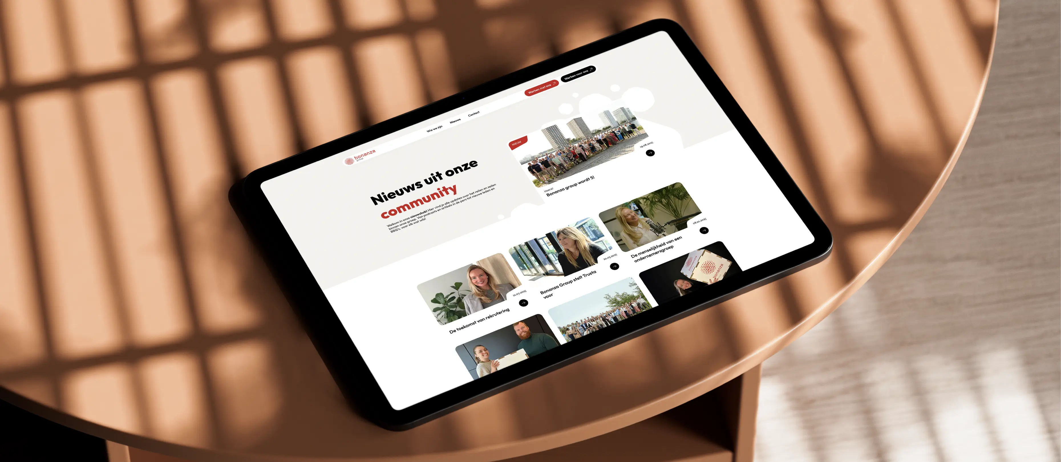 Mockup of the Bonanza Group website on a tablet laying flat on a desk.