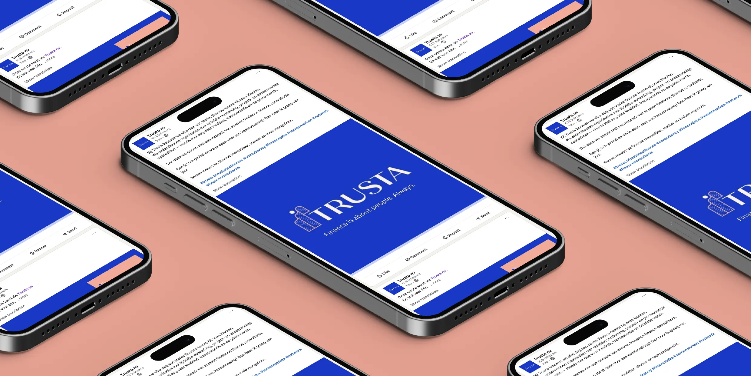 Mockup of a Trusta branded notebook being held in the air against a bright blue background.