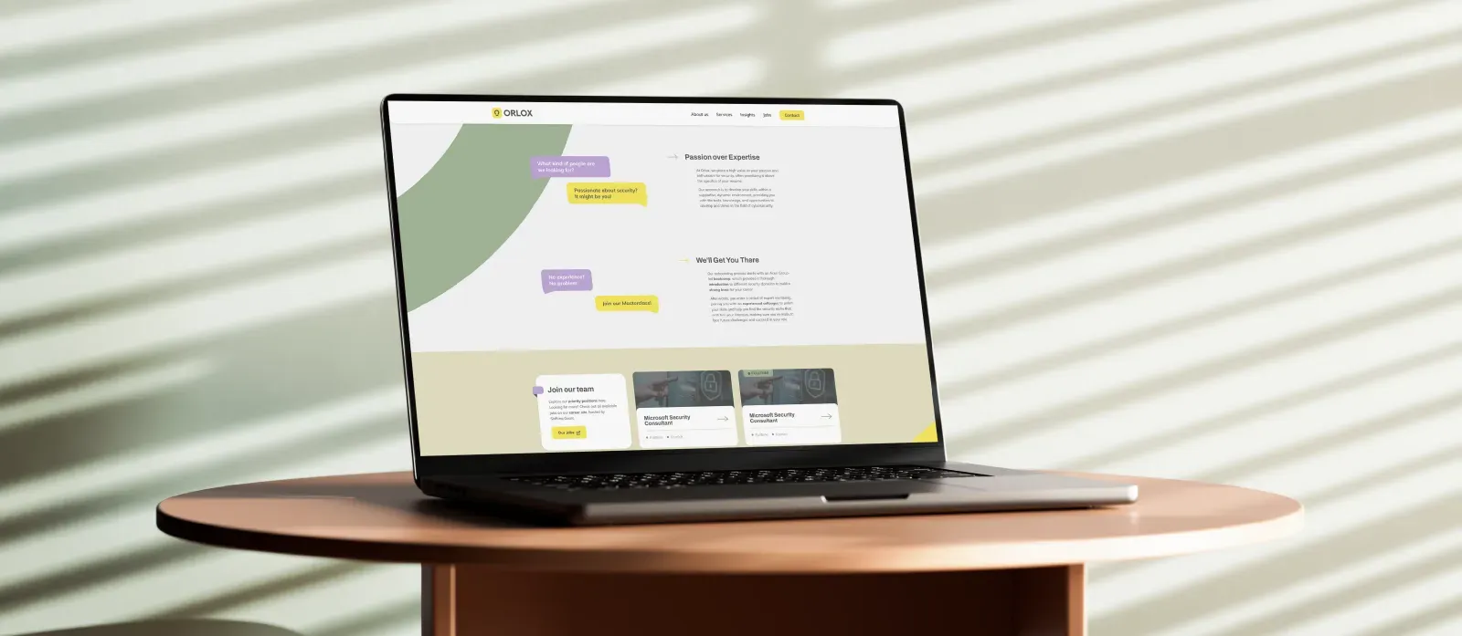 Mockup of the Orlox job webpage on a pc screen on a desk.